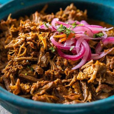  Cochinita Pibil: Delikatne mięso w objęciach pikantnego aromatu!